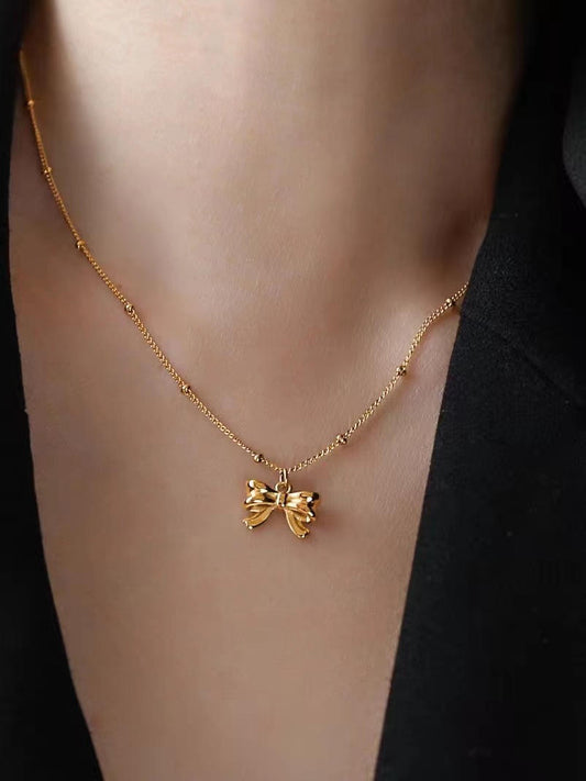Elegant Gold Bow Pendant Necklace